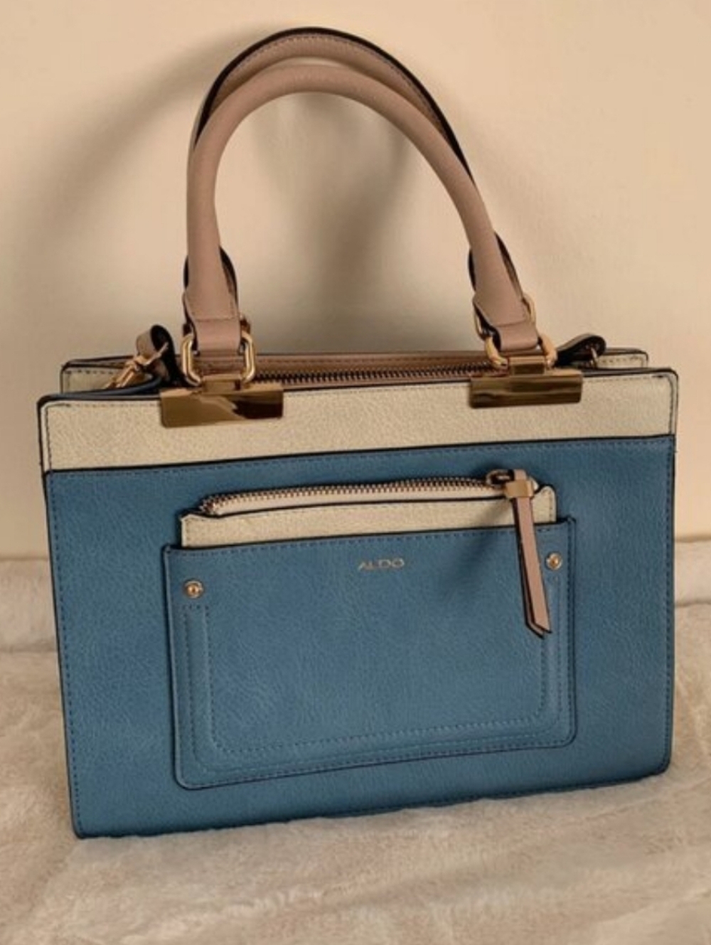 ALDO Novaledo color-blocked handbag featuring a blue & cream Trim w/ tan Handles
